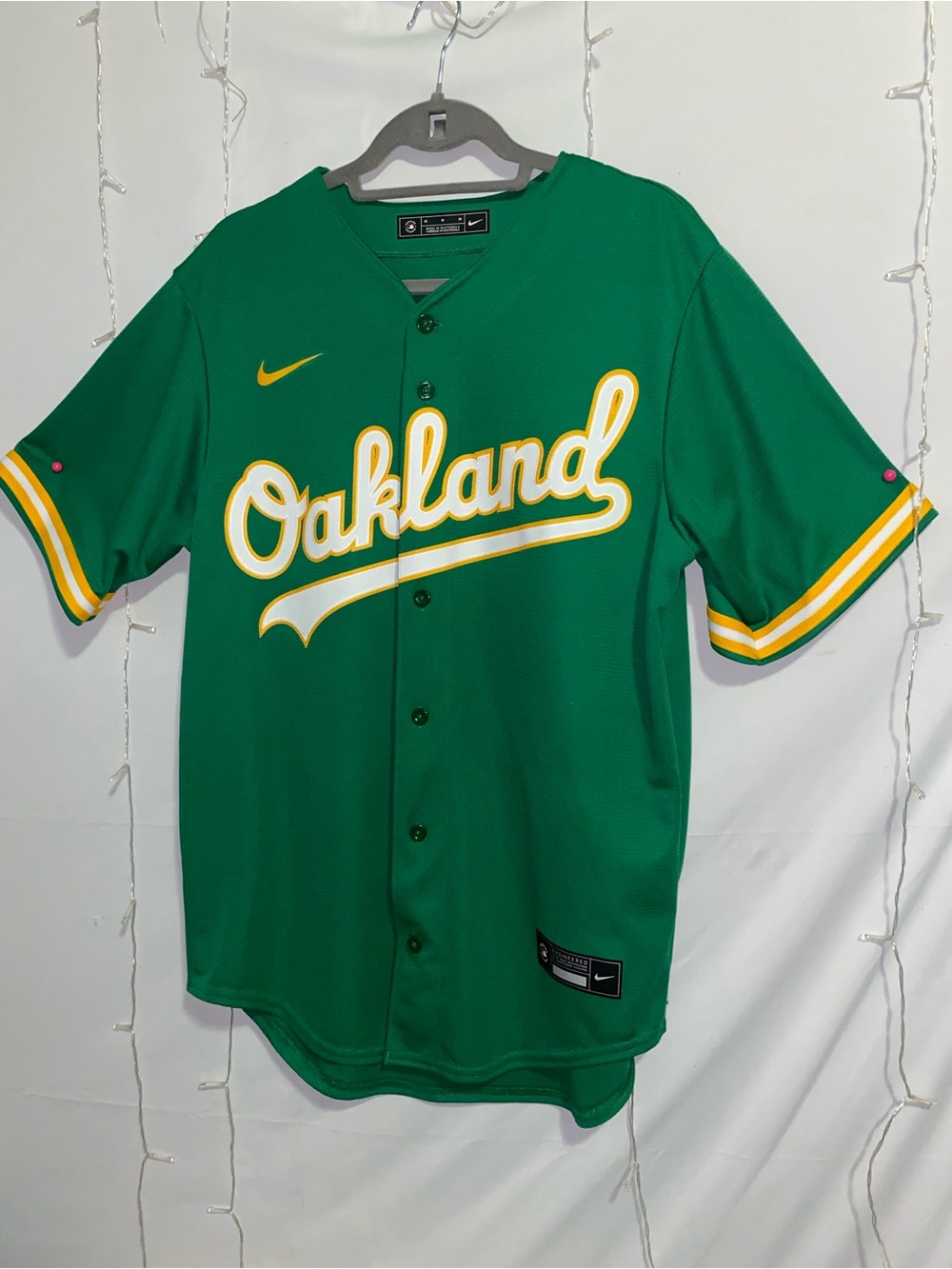 Nike Green Oakland Baseball Jersey with Yellow & White Script